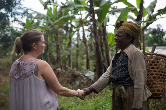 A Peace Corps Volunteer meets a Cameroonian. By meeting each other, they learn about each other's culture and form friendships.